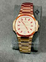 Patek Philippe Nautilus Self Winding 7118/1300 R? Two  Tone Stoned Bezel Everrose Dial and Rose Gold Bracelet