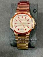 Patek Philippe Nautilus Self Winding 7118/1300 R? Two  Tone Stoned Bezel Everrose Dial and Rose Gold Bracelet - Image 2