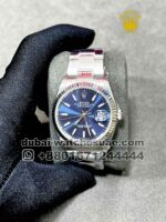 Rolex? 36 mm? Date just Blue dial with silver flutted bezel With Oyster Bracelet