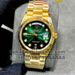 Rolex 36mm gold green face