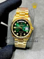 Rolex 36mm gold green face