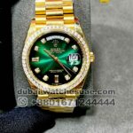 Rolex 36mm gold green face Stoned Bazel