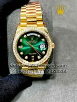 Rolex 36mm gold green face Stoned Bazel