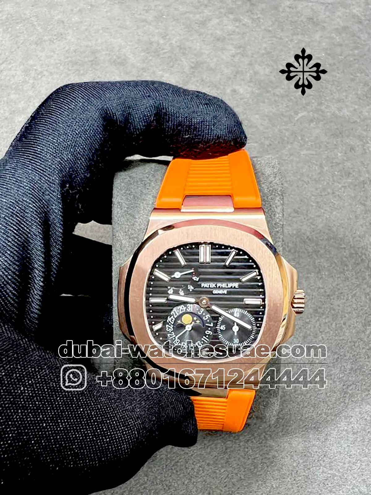 2-a-4-2.jpg Patek Philippe Nautilus 5712 Gray Dial With Orange Rubber strap - Image 1