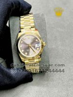 Rolex 31 mm Date ,gold color , light gray