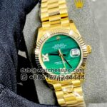 Rolex 31 mm Date Just, Green color, Stoned Roman Numerals with golden bezel