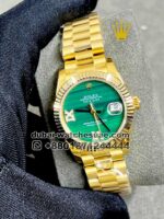 Rolex 31 mm Date Just, Green color, Stoned Roman Numerals with golden bezel