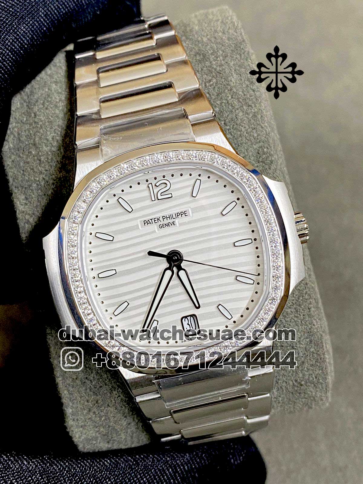 44.1.jpg Patek Philippe Nautilus Ladies White Dial with Stoneworked Bezel Copy Watch - Image 1