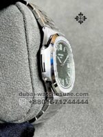 Patek Philippe REF. 5711/1300A-001 A NEW AND UNIQUE COMBINATION OF STAINLESS STEEL AND BAGUETTE DIAMONDS Green Dial and Stainless Steel - Image 2