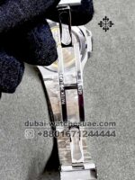 Patek Philippe REF. 5711/1300A-001 A NEW AND UNIQUE COMBINATION OF STAINLESS STEEL AND BAGUETTE DIAMONDS Green Dial and Stainless Steel - Image 4