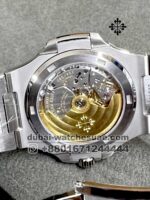 Patek Philippe REF. 5711/1300A-001 A NEW AND UNIQUE COMBINATION OF STAINLESS STEEL AND BAGUETTE DIAMONDS Green Dial and Stainless Steel - Image 6